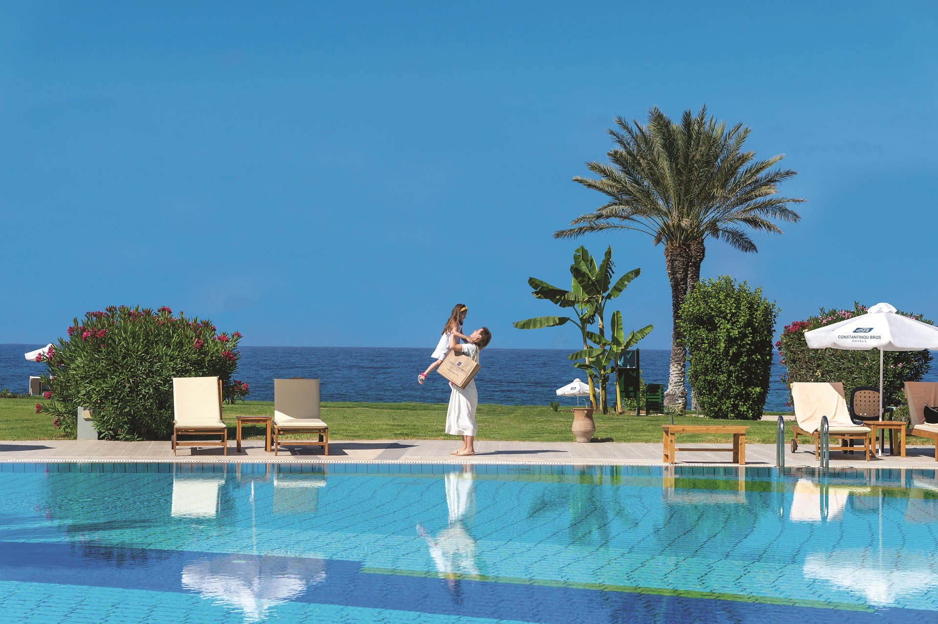 10 ATHENA BEACH HOTEL POOL AND SEA VIEW