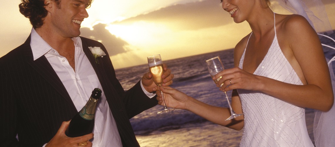 Asimina_Suites_Hotel_wedding_couple_by_the_beach