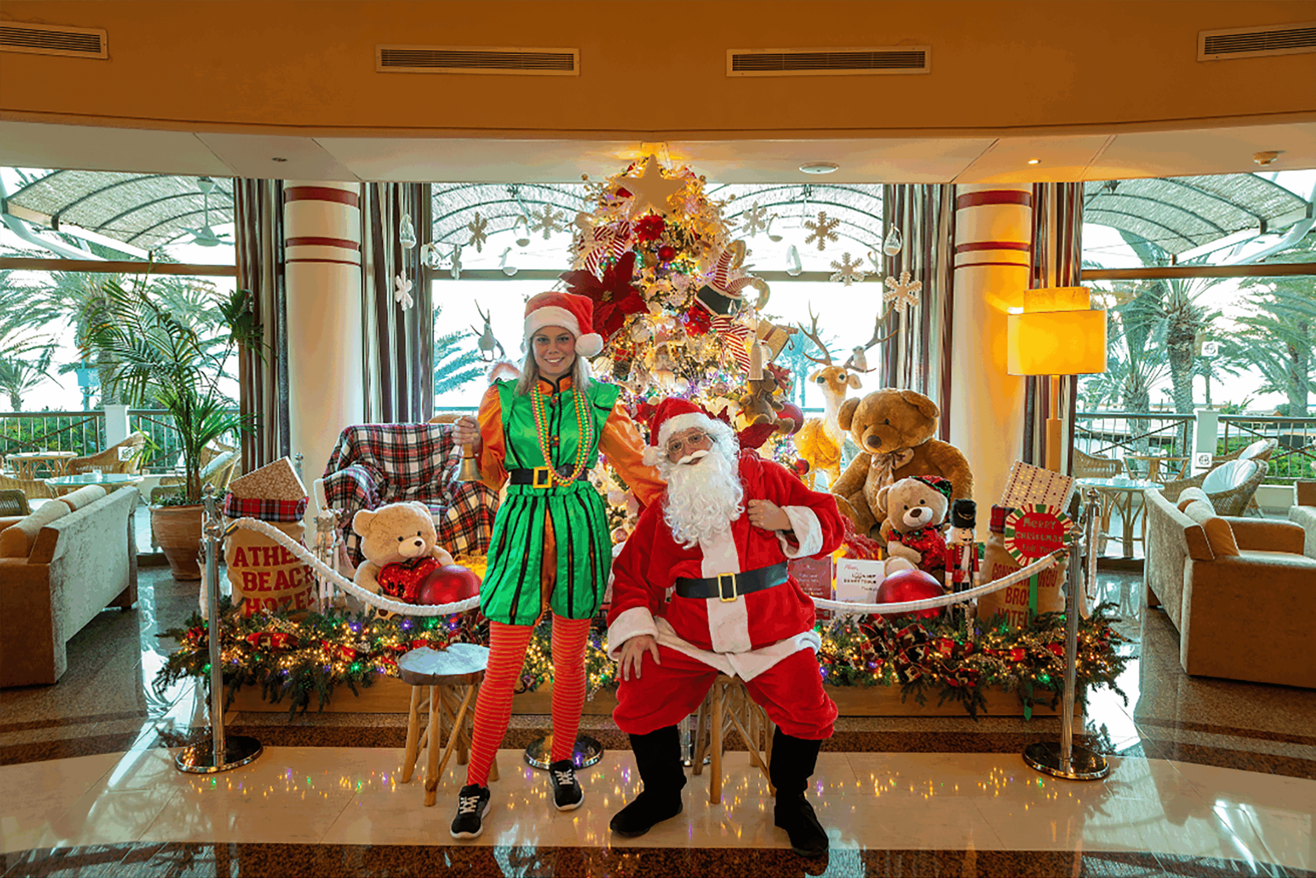 Photo of Santa Claus with an Elf copy